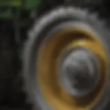 Detail view of John Deere tractor wheel design showcasing engineering precision