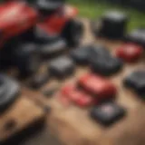 A close-up view of various Honda lawn mower parts laid out on a wooden surface