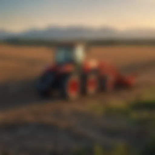 A Kubota tractor in a vast Canadian field during sunset