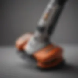 A close-up view of a small trimmer showcasing its ergonomic design and sharp blades.