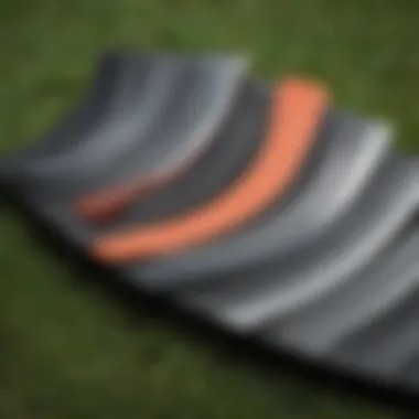 Close-up of various zero turn mower blades to compare types